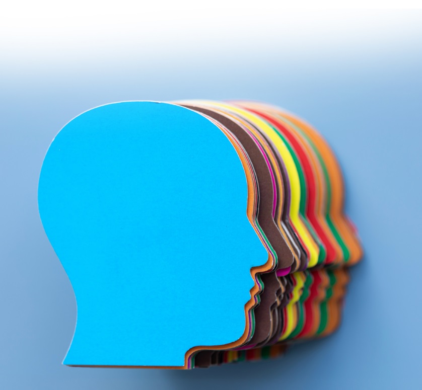 A decorative image depicting a series of side profile head shapes against a blue background