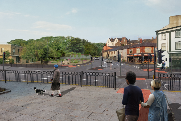 Artist impression of the widened Ramsay Brow junction looking up from Washington Street. The new landscaped pocket park green space is shownto the left of the Ramsay Brow roadway, adjacent to the red brick Workington Magistrates’ Court.