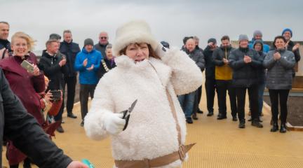 Cllr Carni Carron-Holmes cutting the ribbon on the Maryport Boardwalk