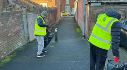 litter champions picking up litter