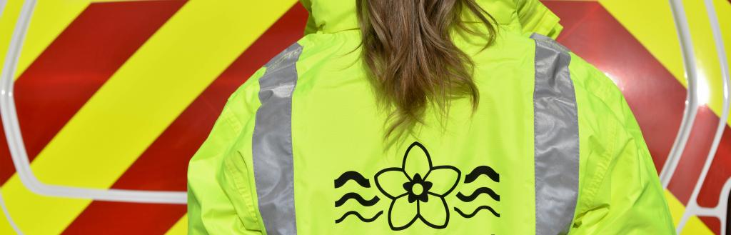 Highways team member wearing yellow jacket