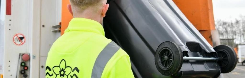 Man emptying bin