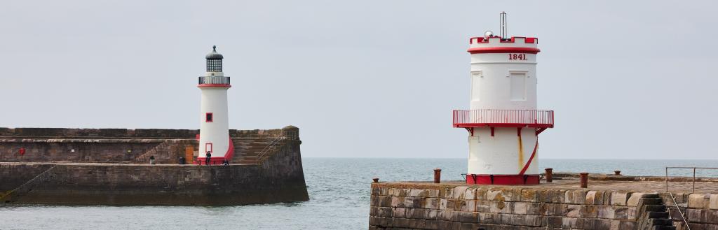 Whitehaven harbour with the two light houses