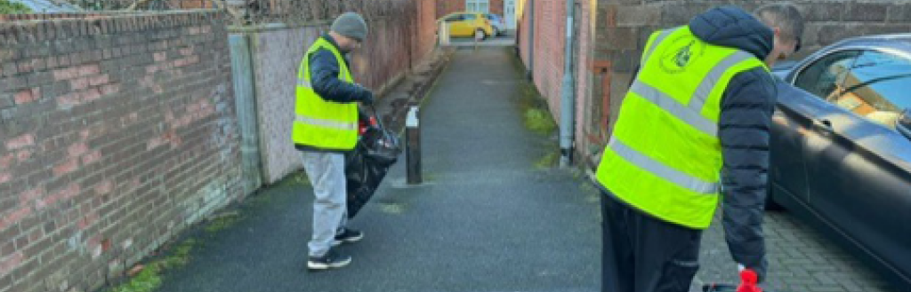 litter champions picking up litter